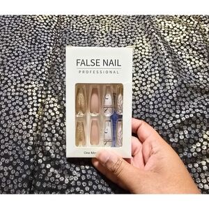 Pink, Gold, And White False Nails